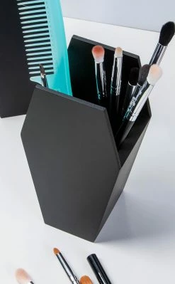 The Haunted Mansion Home & Gifts Contour Catacomb Coffin Brush Holder