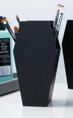 The Haunted Mansion Home & Gifts Contour Catacomb Coffin Brush Holder